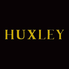 Huxley Press magazine logo. Arts and culture magazine that featured Maggie O'Hara digital artist 